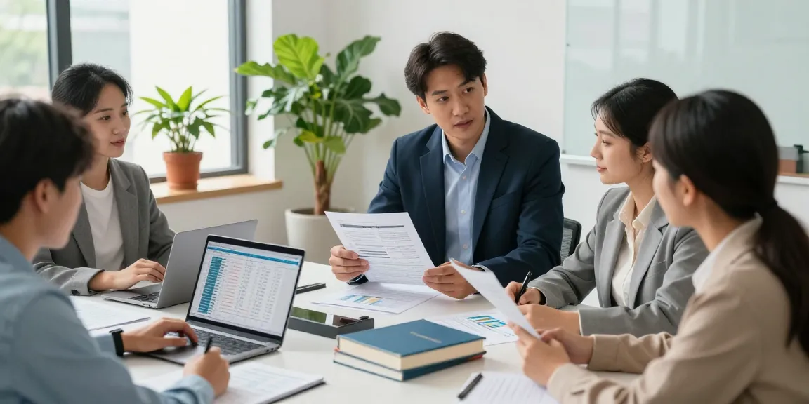 Property tax consultant assisting landlords in a modern office environment, discussing tax documents and strategies.